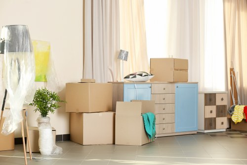 Flat removals team planning access and loading for an Acton apartment move