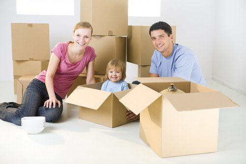 Boxes and furniture being loaded into a removals van