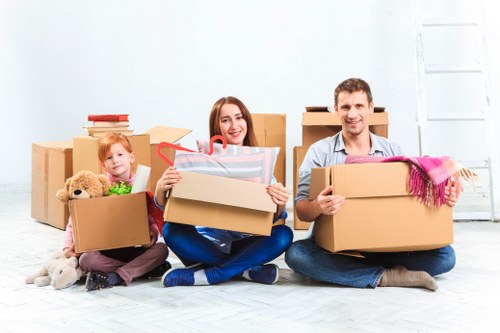Careful removal of wardrobes and beds from an Acton home