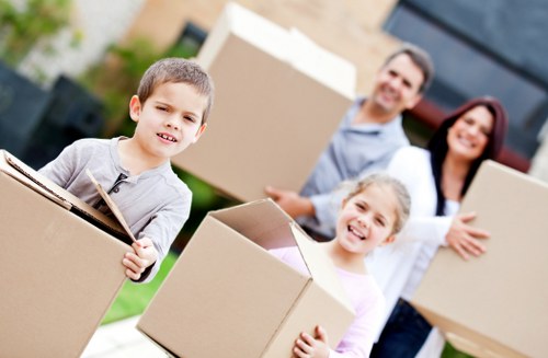 Same day removals team loading items for a quick Acton move