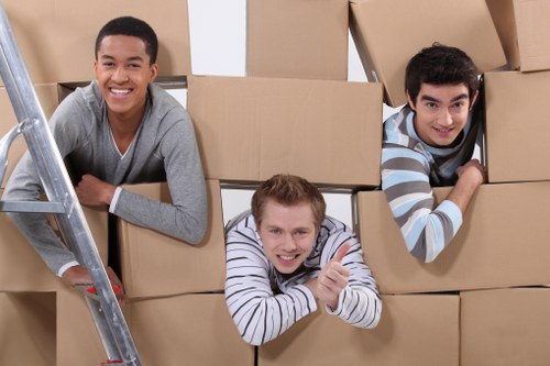 Commercial removals vehicle loading office furniture near Acton