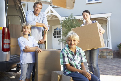 Customer and removal crew reviewing service terms