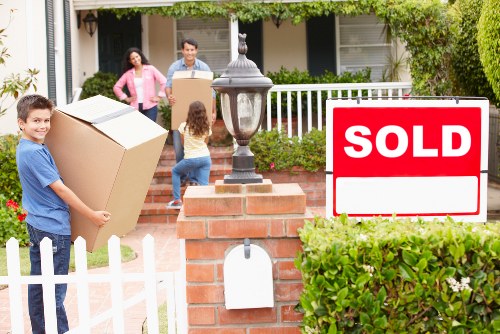 Organised unpacking of boxes in a new Acton property